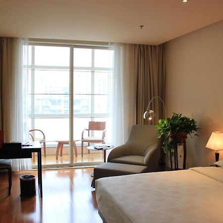 Green Park Hotel Tianjin Binhai  Стая снимка